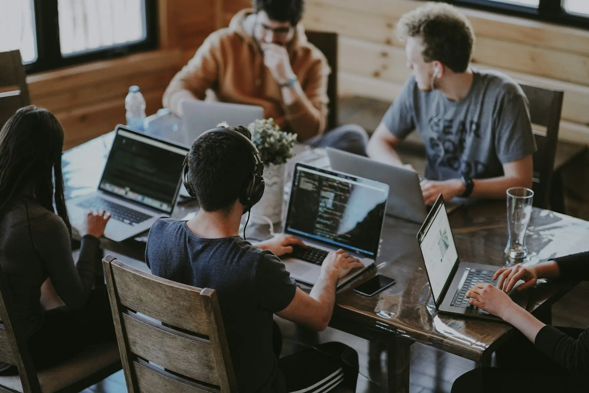 Common Use Cases for Odoo and Microsoft 365 Integration group of people using laptop computer